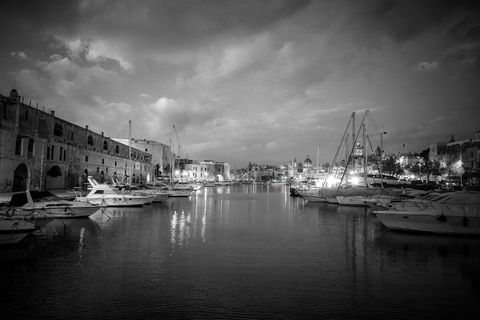 Harbour at night with moored boats — Tom Fisk on Pexels