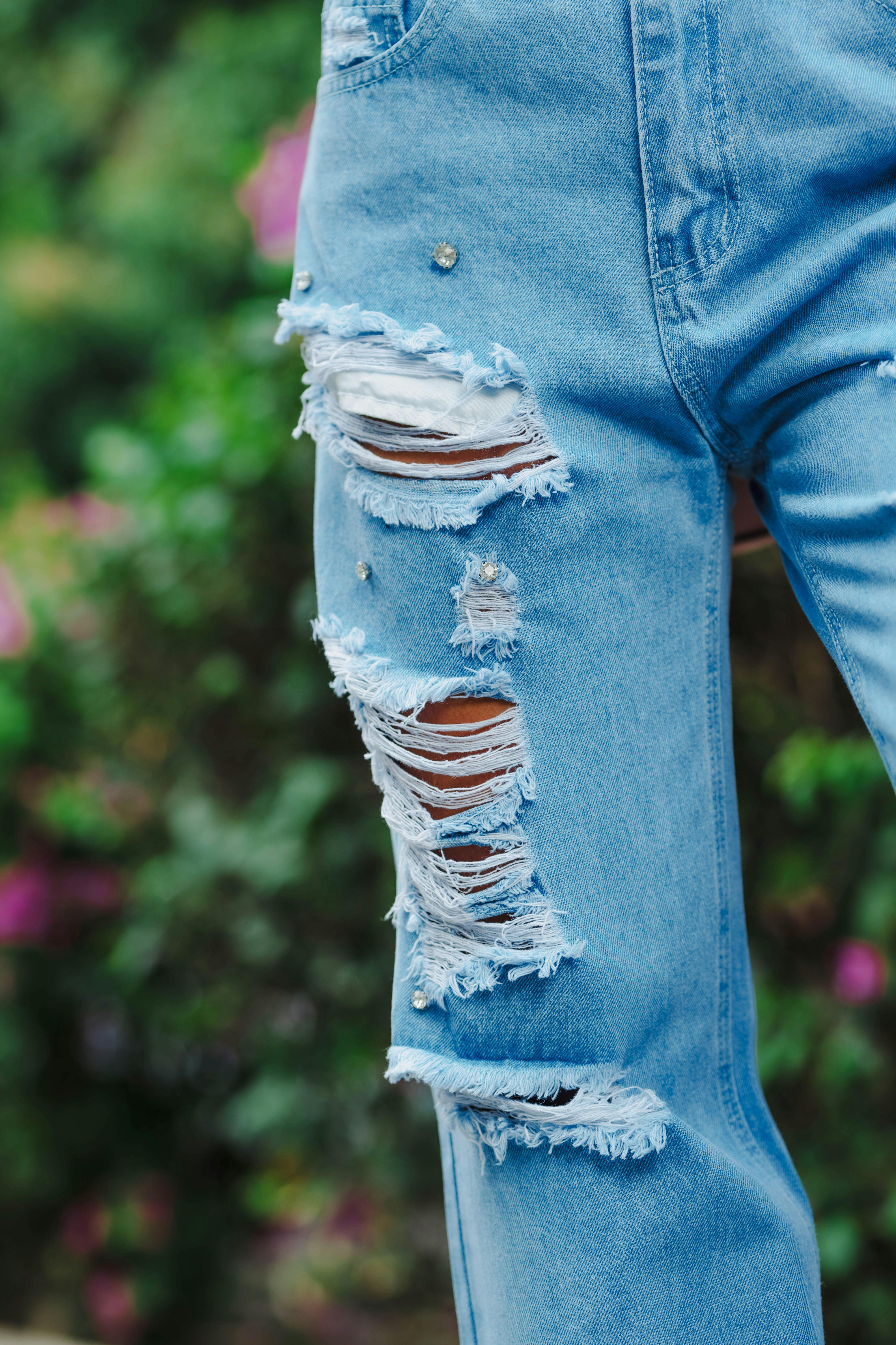 Close-up of Stylish Ripped Denim Jeans · Free Stock Photo