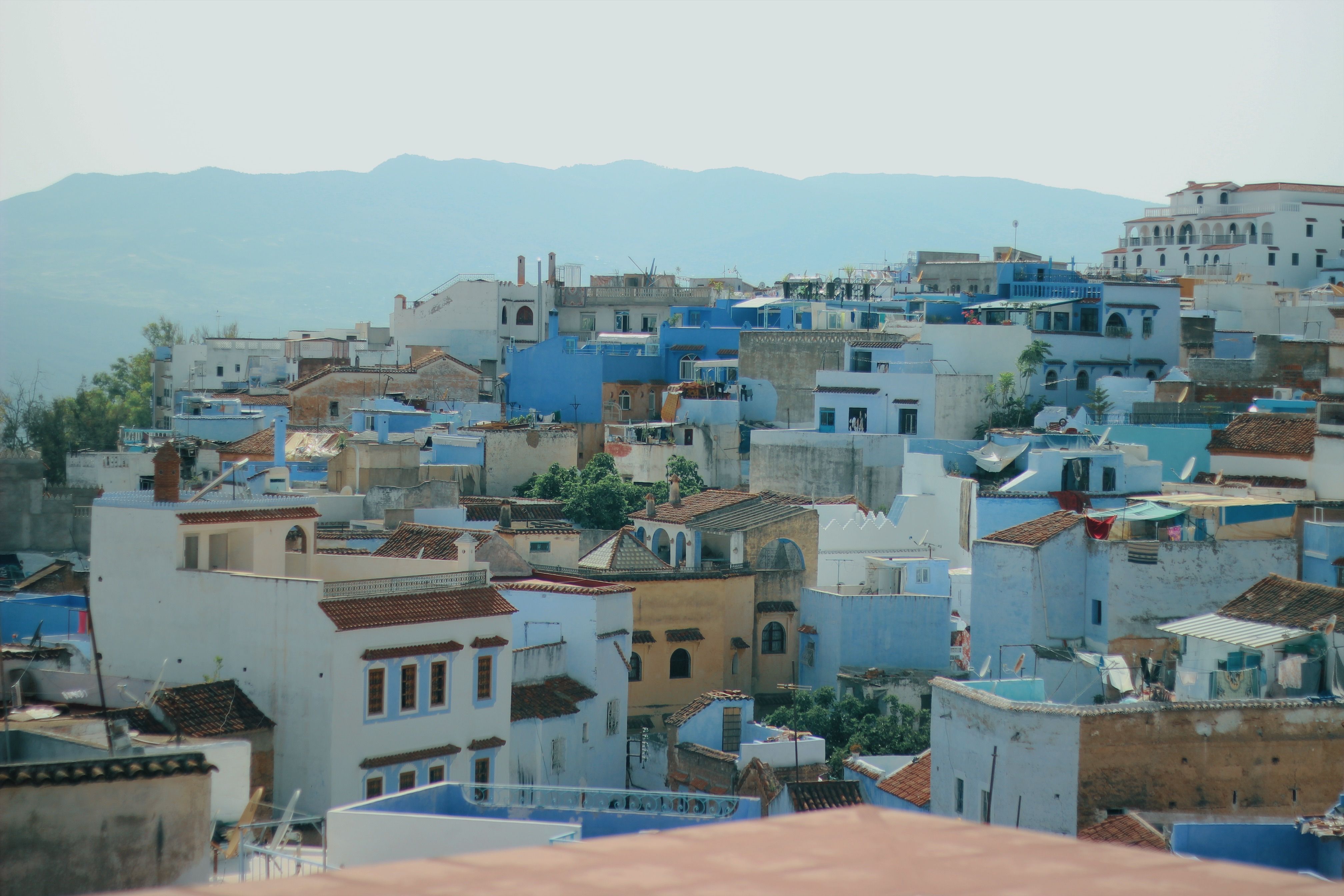 chefchaouen morocco medina blue white houses staircase street photography