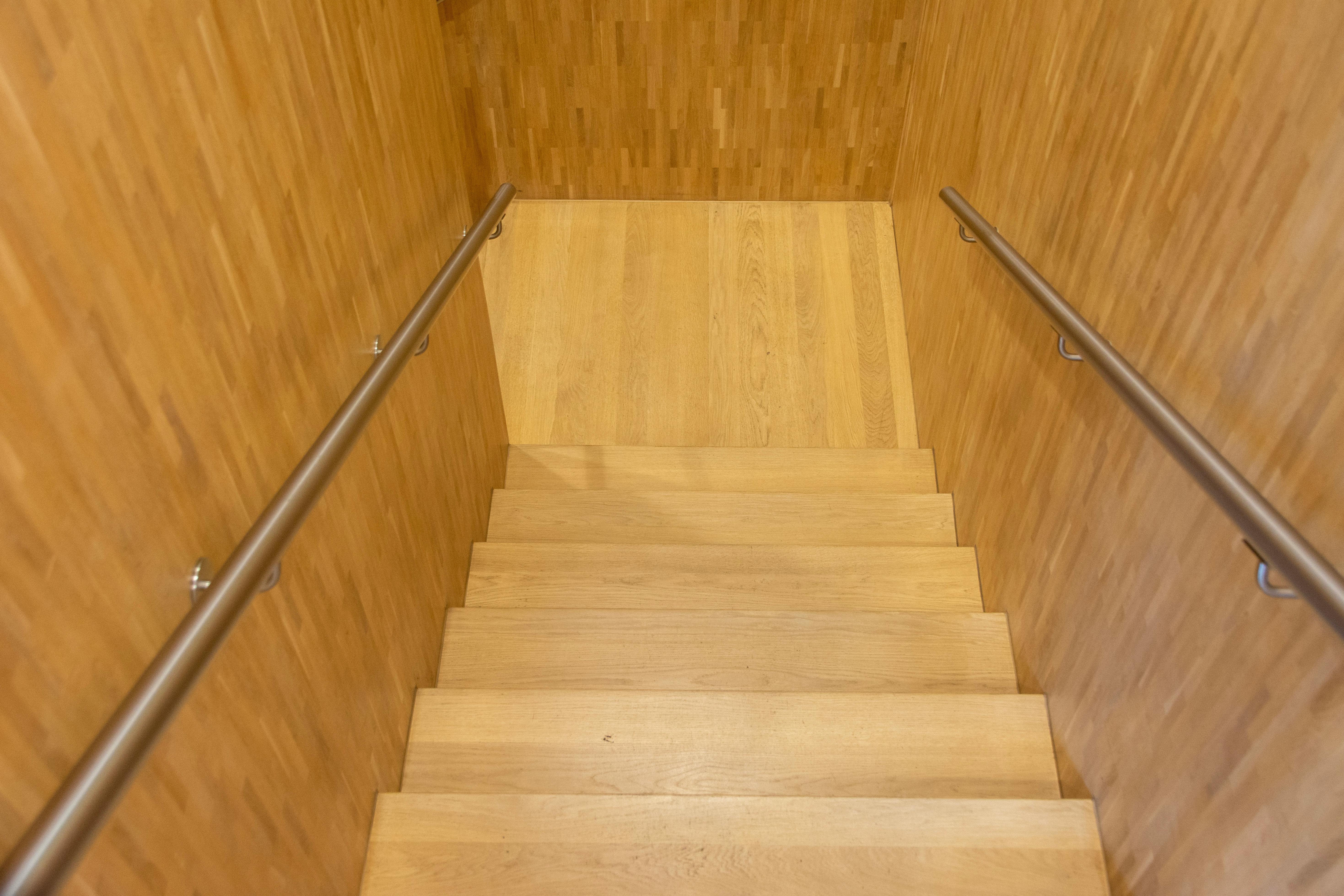 Narrow timber stair connecting the two floors of Foreign Bookstore Foreign in Itaewon