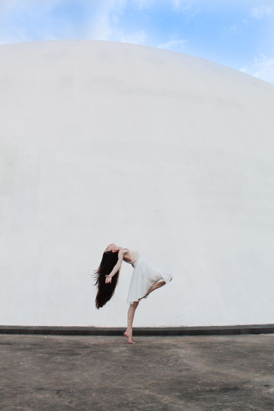 Minimalist dance pose against geometric backdrop - Nocturne contemporary dance poster