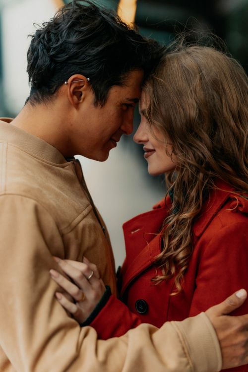 Free A couple shares a tender moment on the streets of Buenos Aires, Argentina. Stock Photo