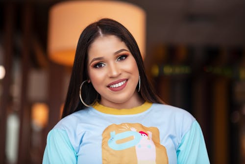 Selective Focus Portrait Photo of Smiling Woman