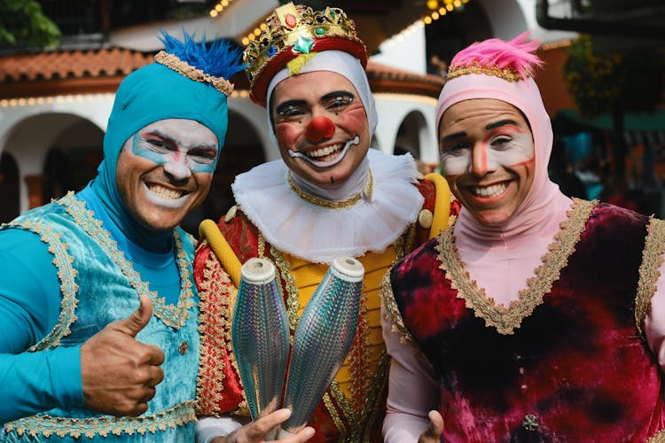 Three Jugglers With Smiling Faces