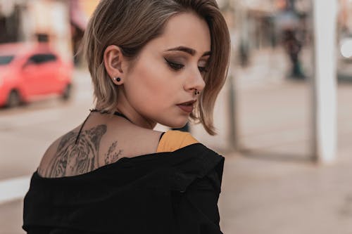 Free Woman With Tattoo On Her Back Stock Photo