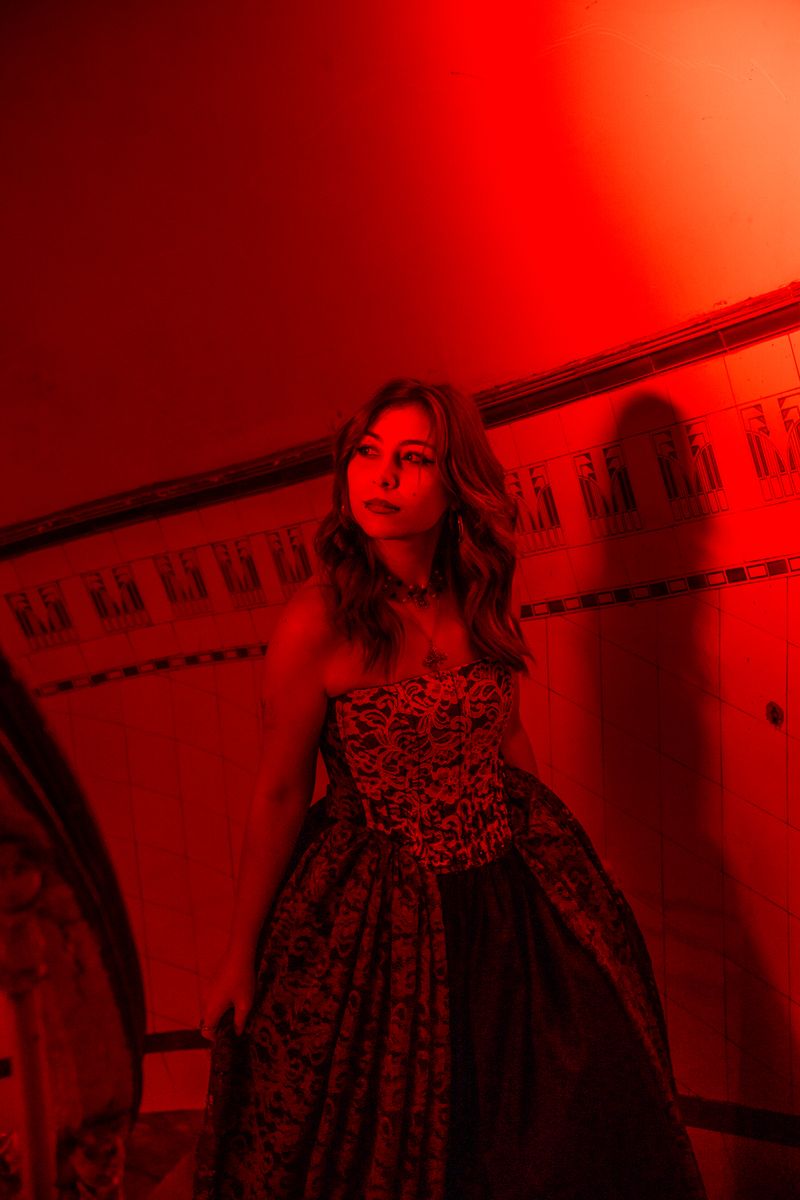 Woman in Red Dress Sitting on Chair · Free Stock Photo