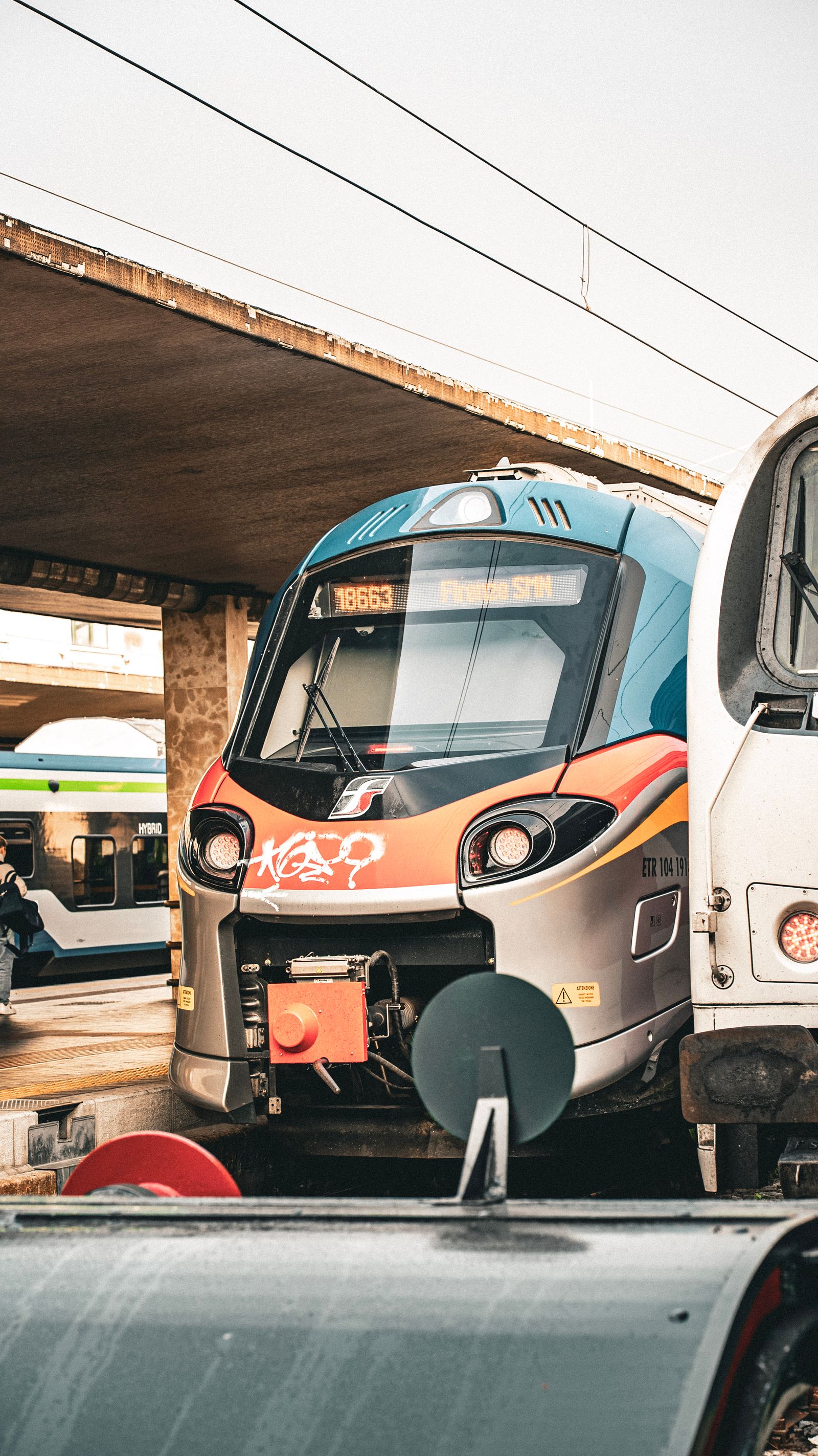 Train departing an Italian airport station