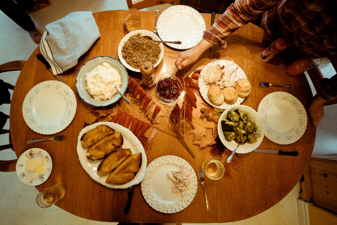 Flatlay Photography of Cooked Food on Brown Wooden Table
