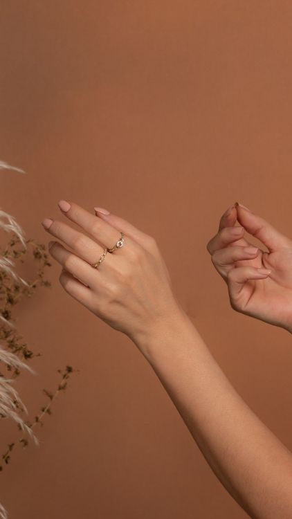 Elegant Hand Modeling Minimalist Gold Rings · Free Stock Photo