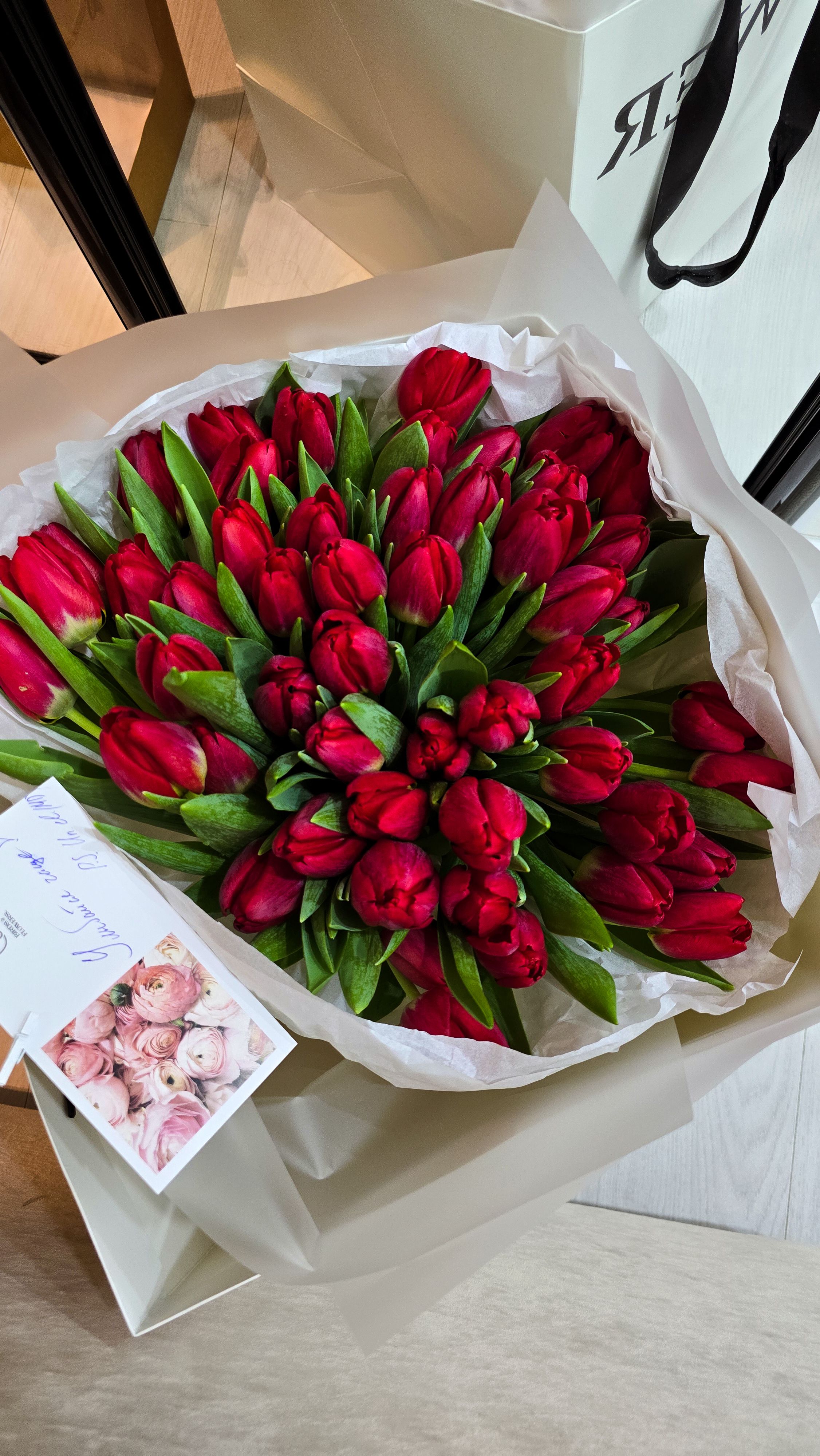 Vibrant Bouquet of Red Tulips in Gift Box · Free Stock Photo