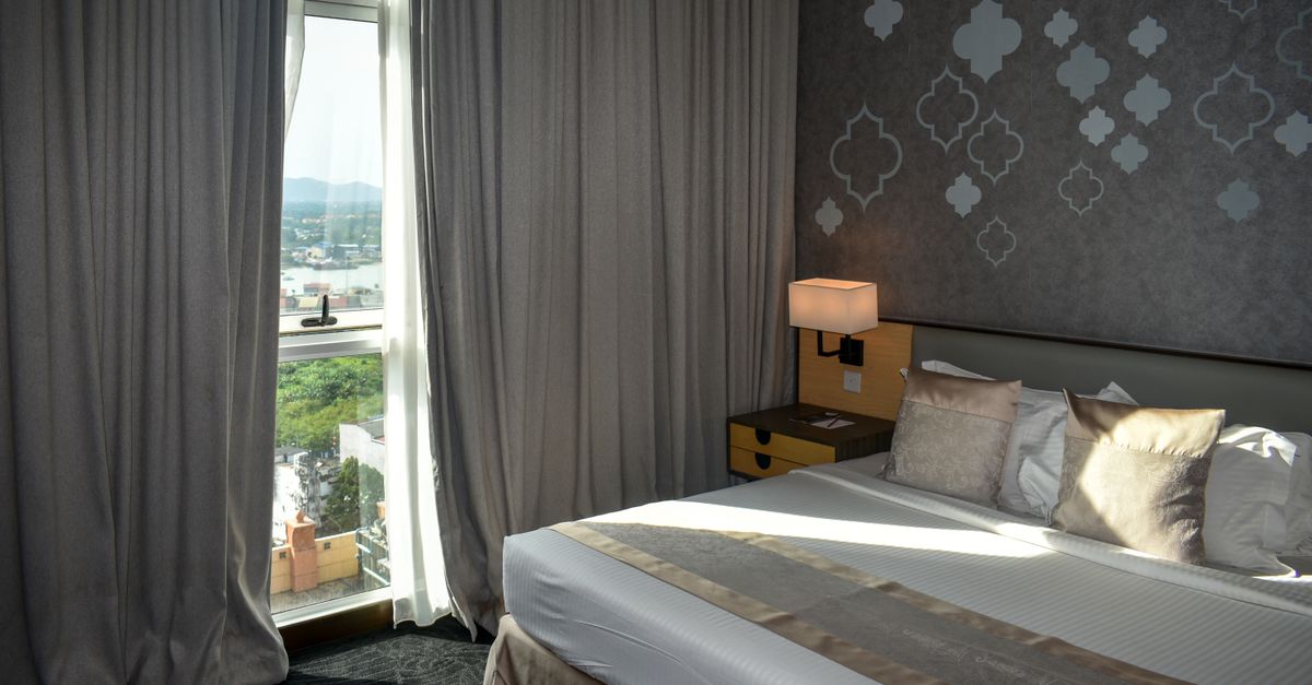 Modern hotel room with local art and large windows