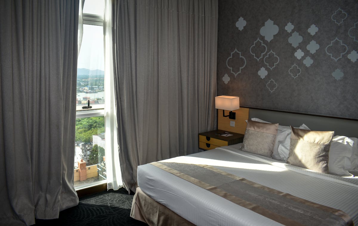 Modern hotel room with mountain-facing window