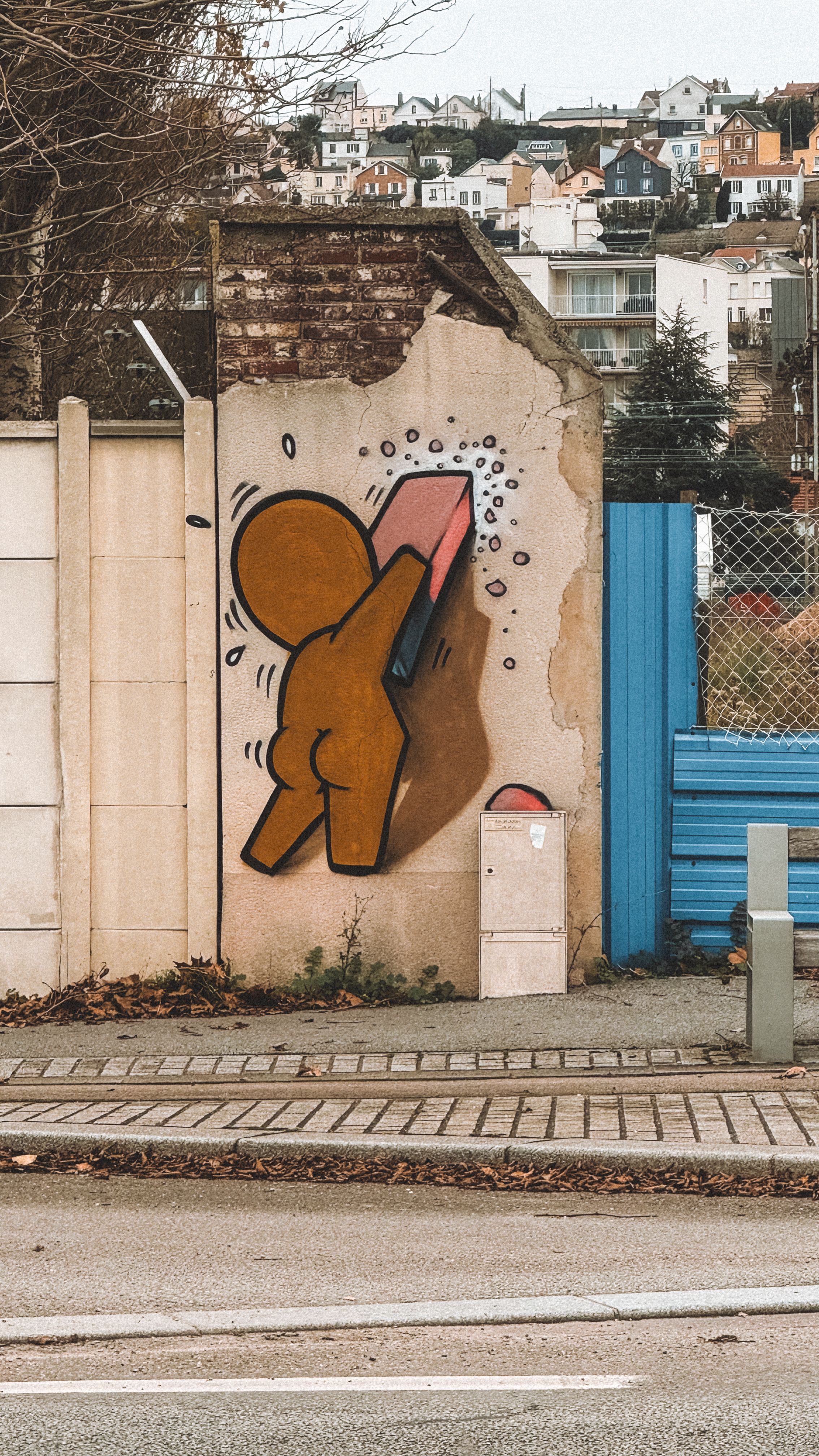 Vibrant street art on urban wall with cityscape · Free Stock Photo