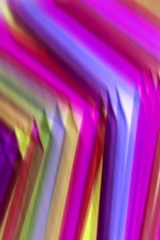 Dynamic abstract image featuring bold and vibrant colorful lines creating a visual wave effect.
