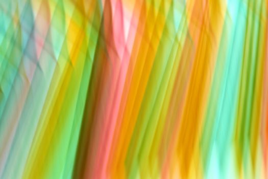 Abstract motion blur in vibrant colors creating a dynamic artistic pattern.