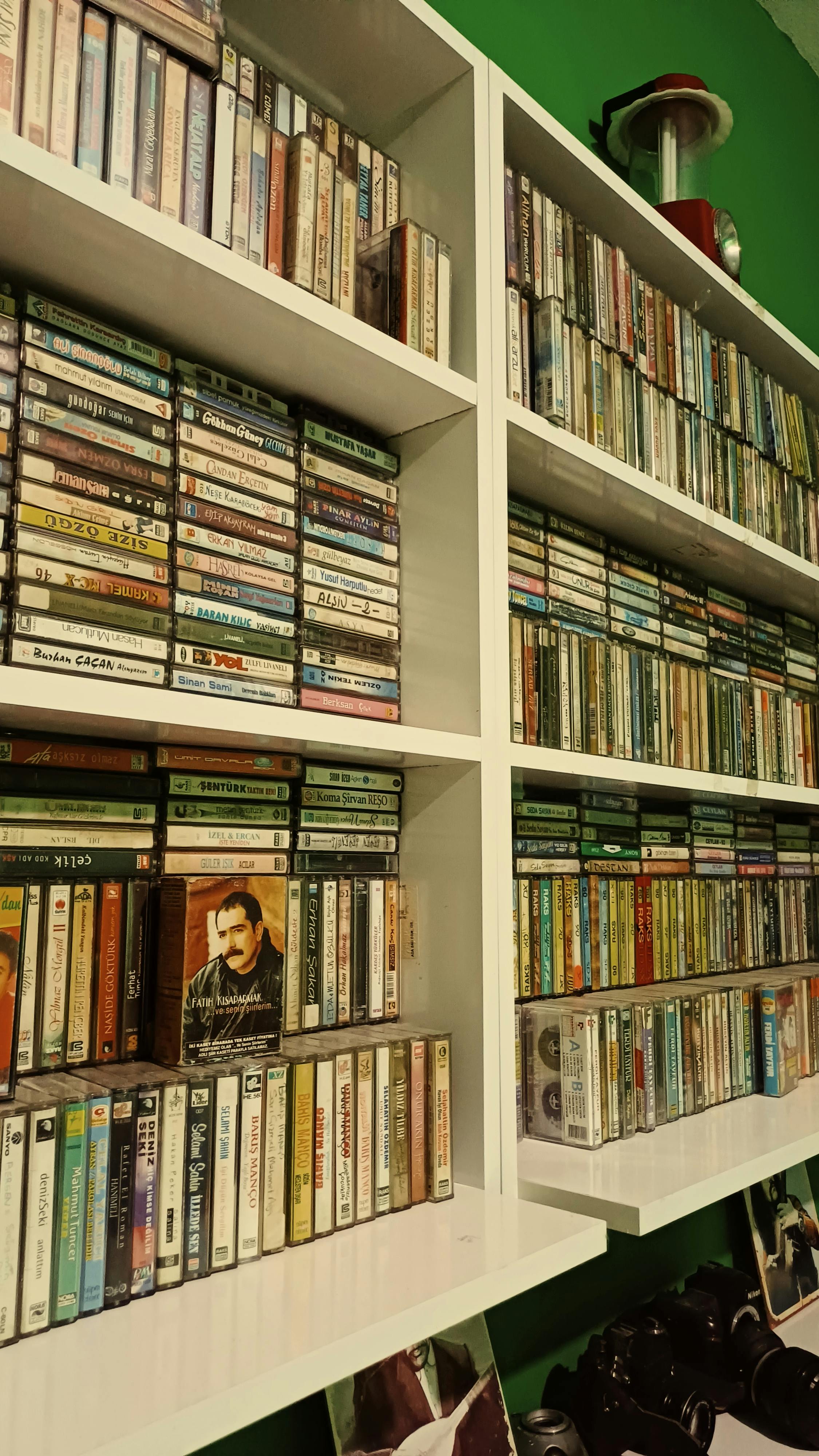 vintage cassette tape collection on shelves