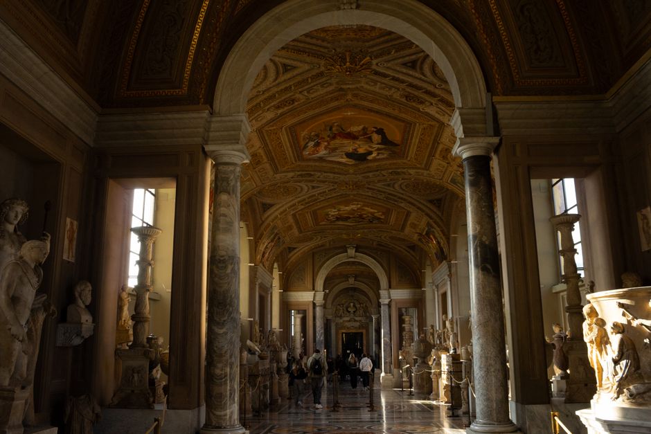 Tourists admiring sculptures inside the Borghese Gallery in Rome
