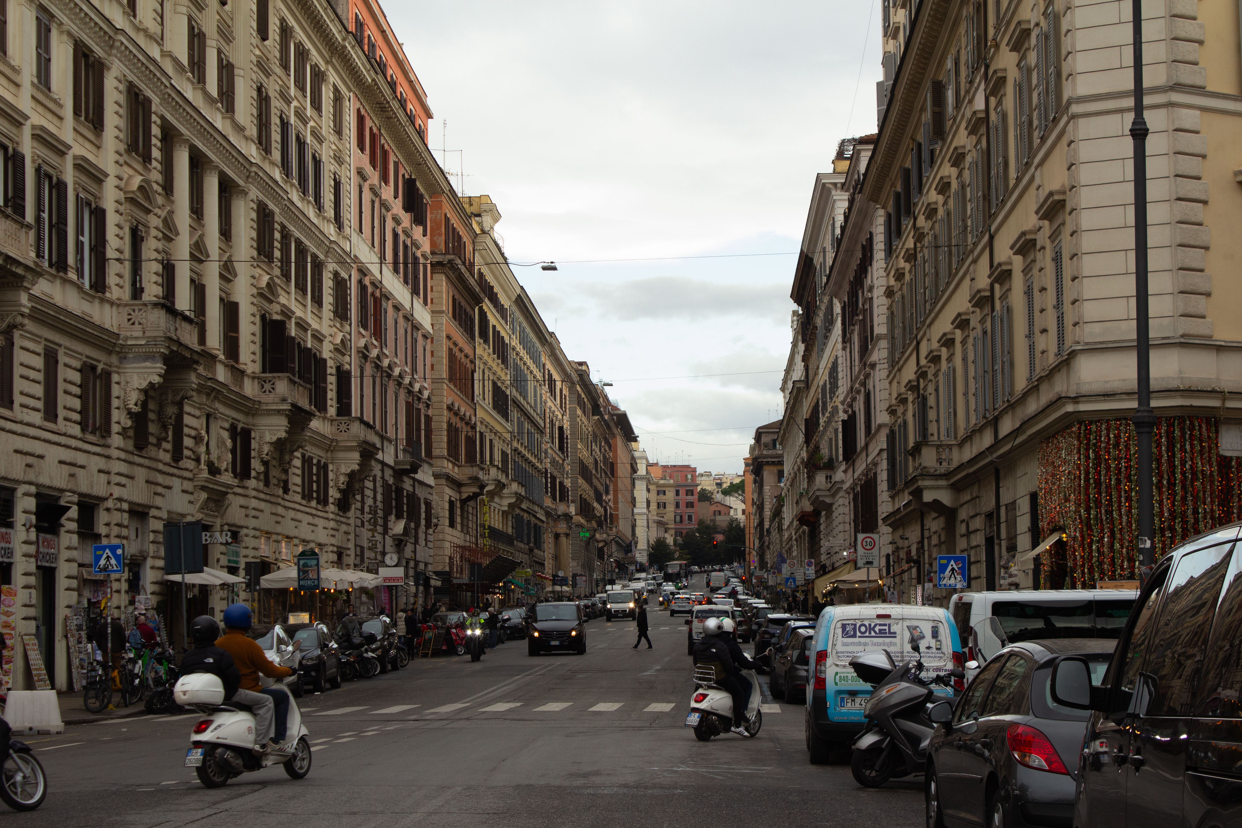 Bustling Roman Street Scene in Urban Setting · Free Stock Photo