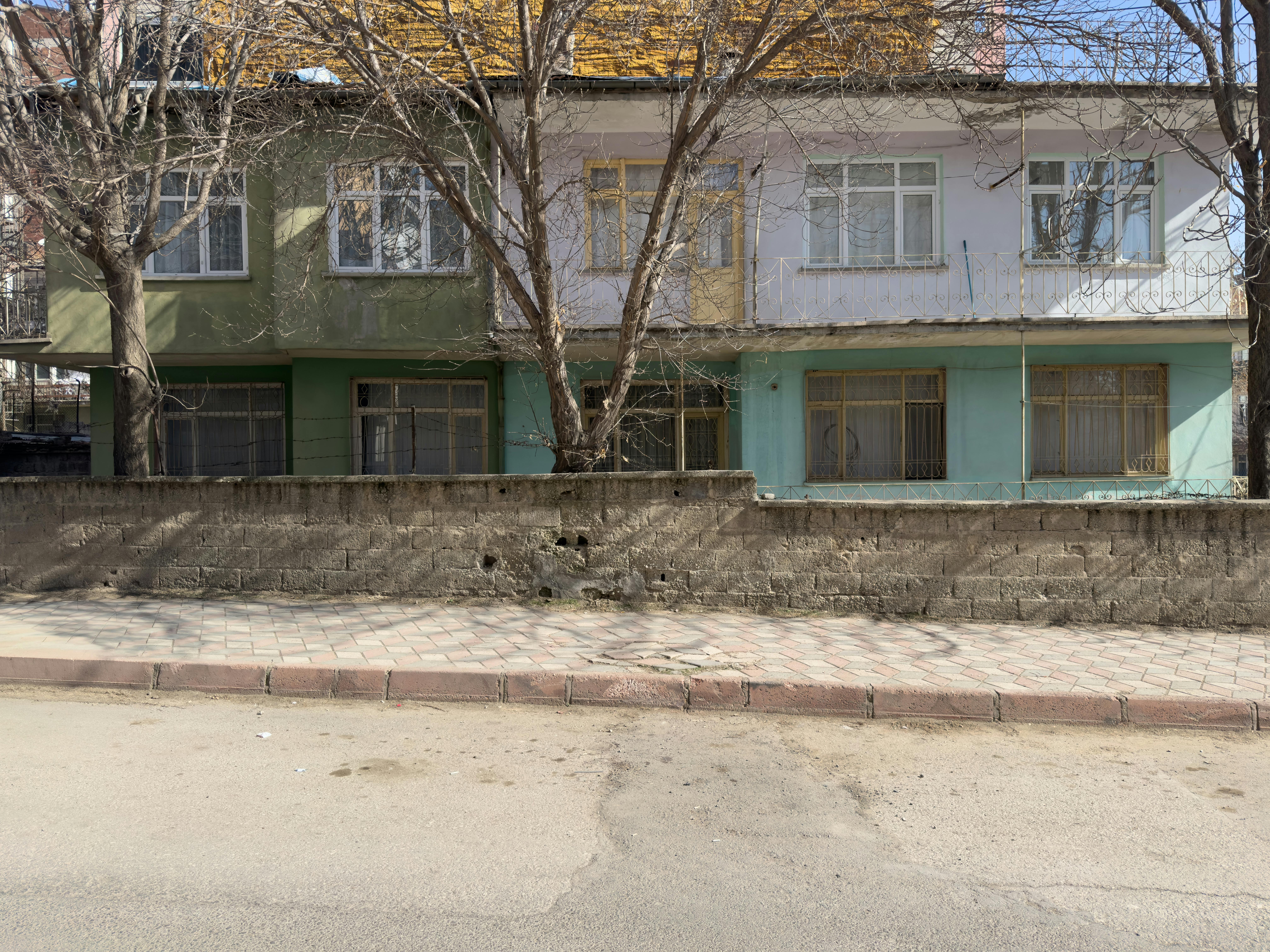 Facade of residential buildings on a sunny day in El&acirc;zığ, T&uuml;rkiye.
