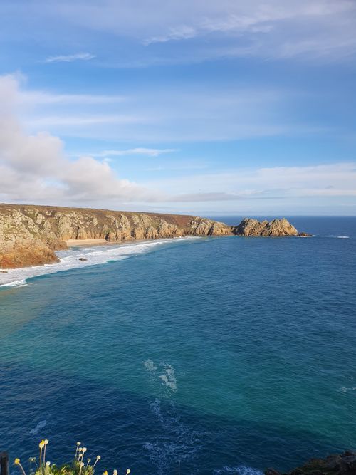 Free Stunning view of rugged cliffs and expansive ocean at Cornwall's coastline. Stock Photo