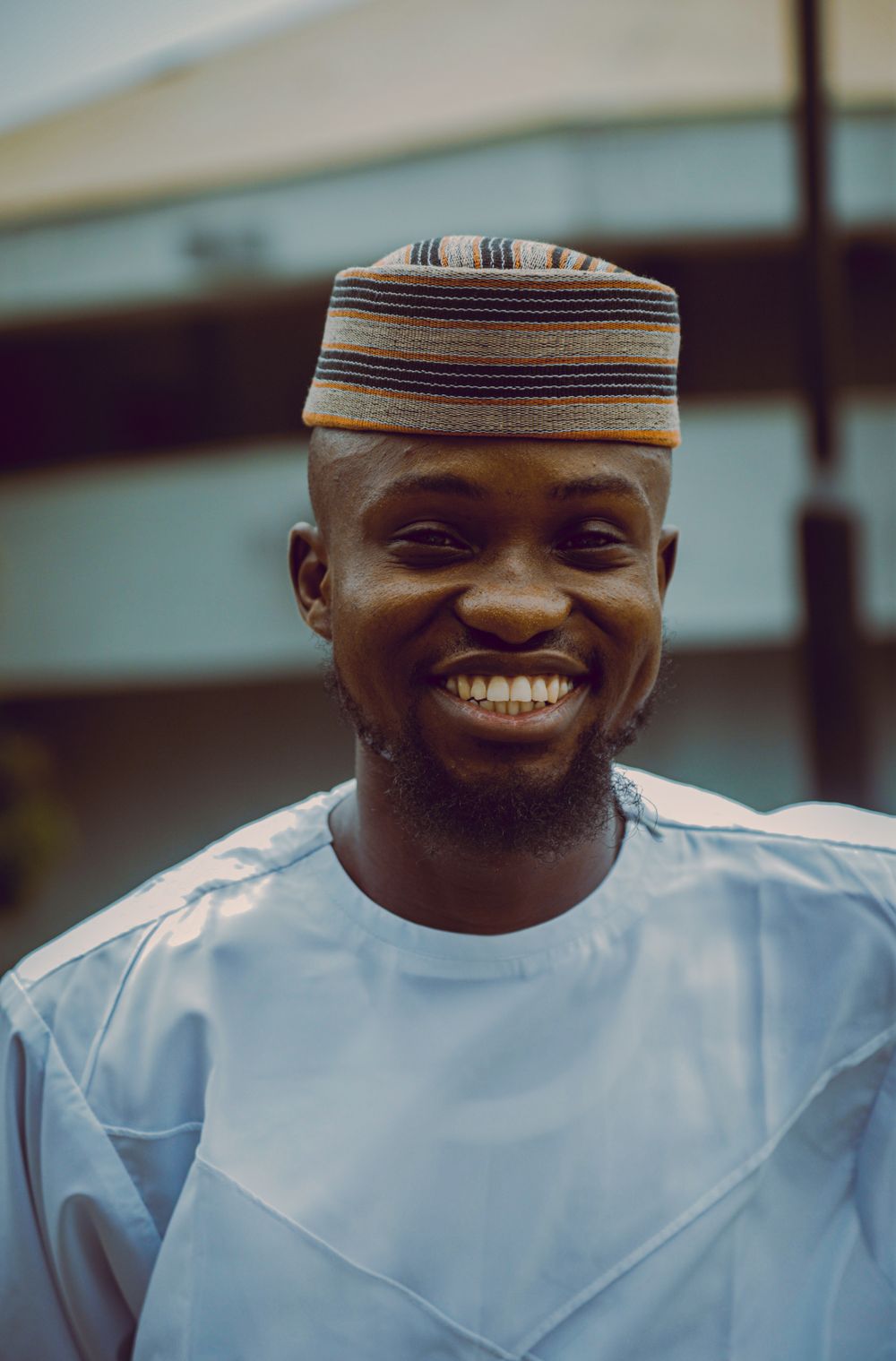 A smiling Nigerian man