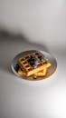 Delicious Waffles with Fresh Blueberries on Plate