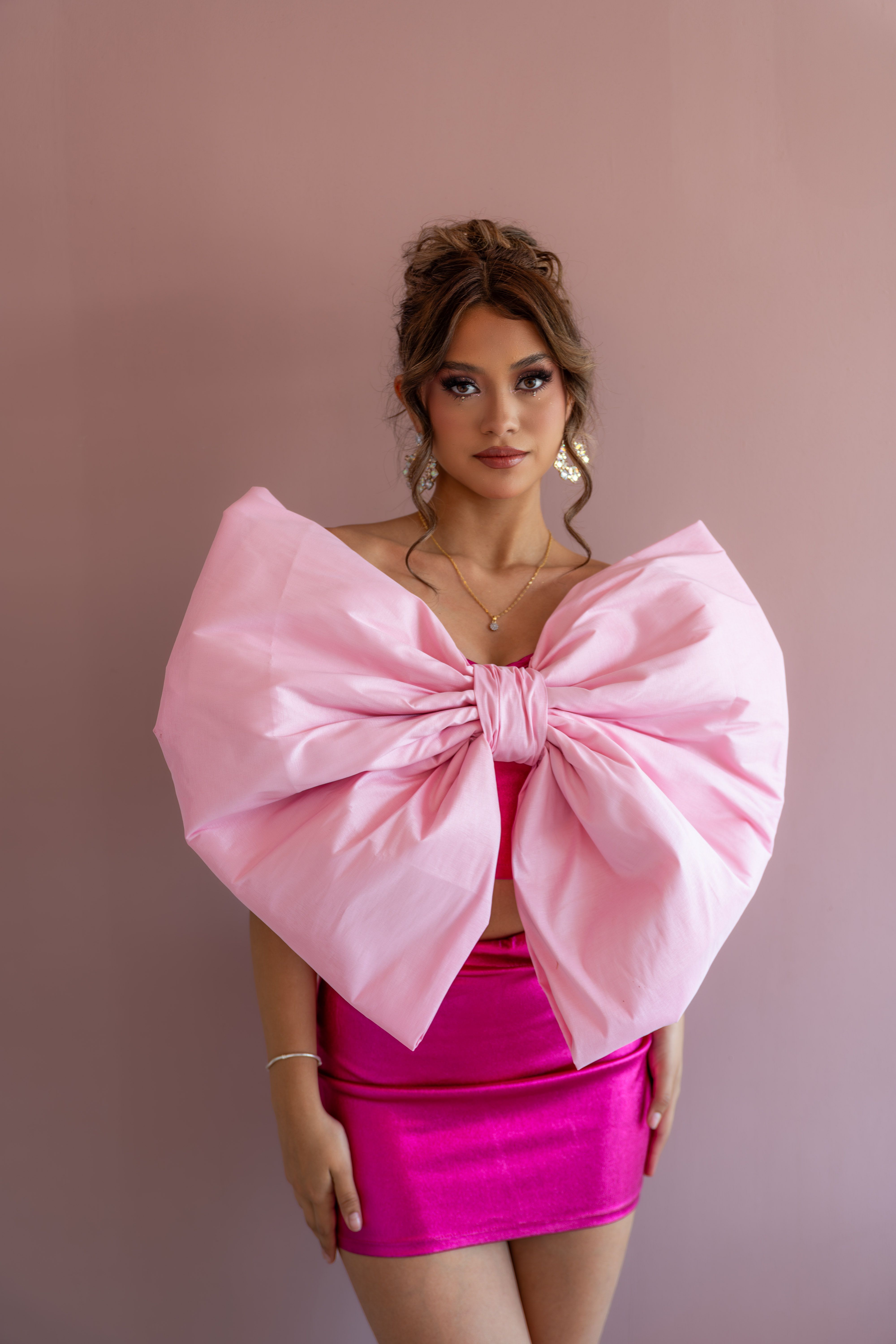 woman-in-fashionable-pink-bow-dress-posing-free-stock-photo