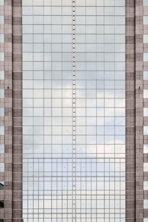 Free Photo of Concrete and Glass Building Stock Photo