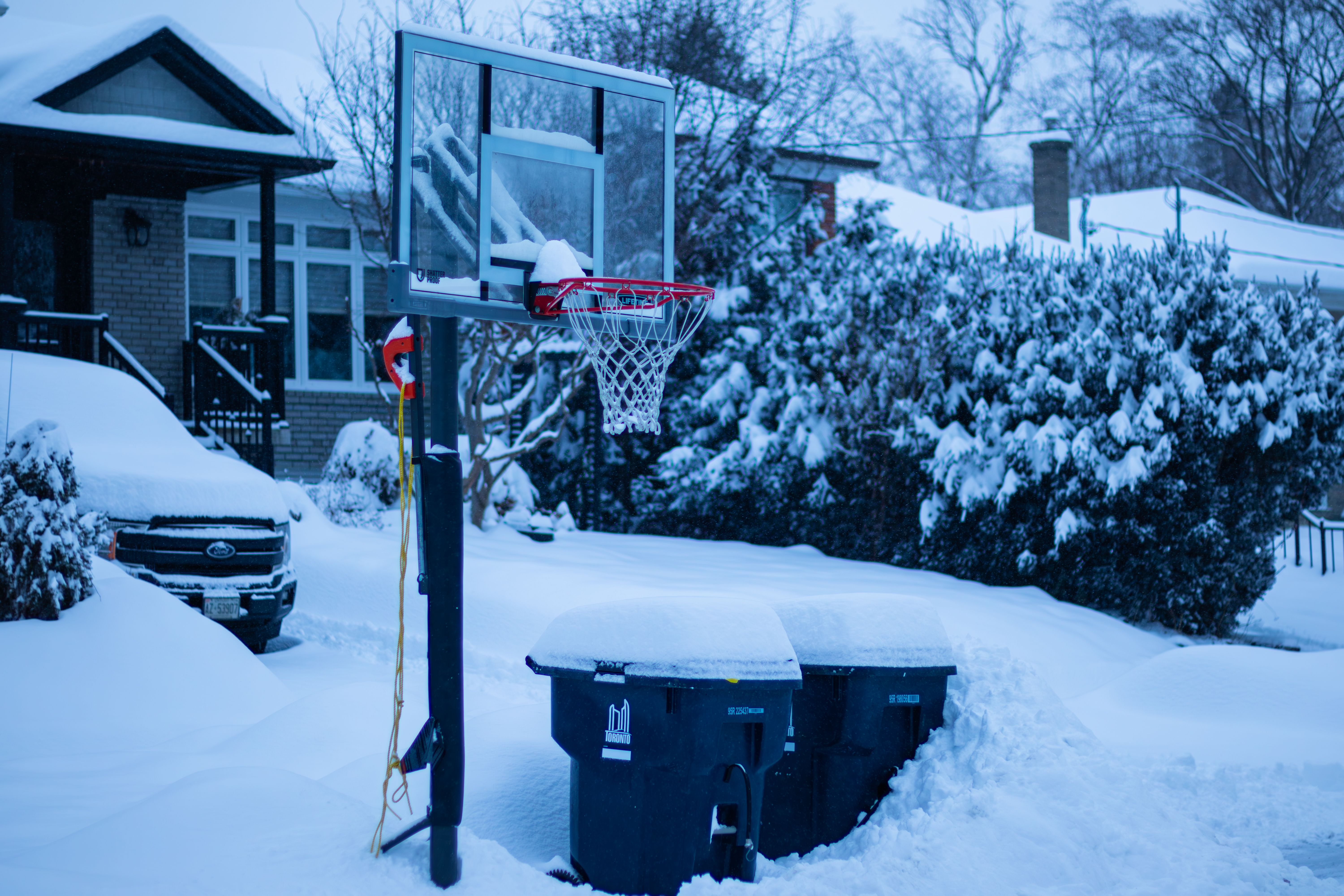 A residential street in a Canadian suburb where driveway repair calls are made