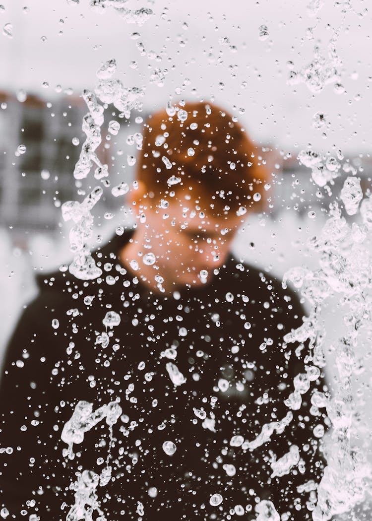 Man Behind Water Splash