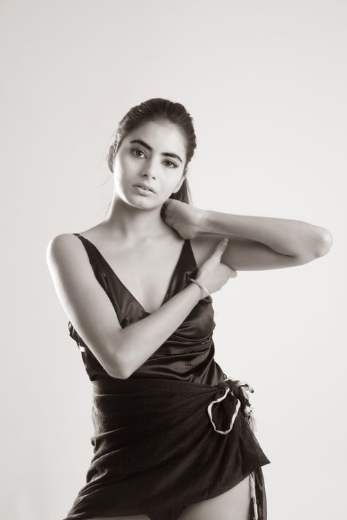Free Artistic black and white portrait of a woman in a stylish dress. Stock Photo