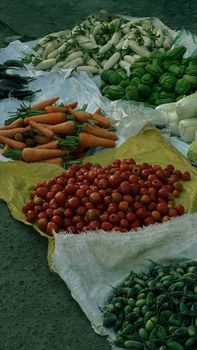 Colorful array of fresh vegetables at a local market in Gia Lai, Vietnam.