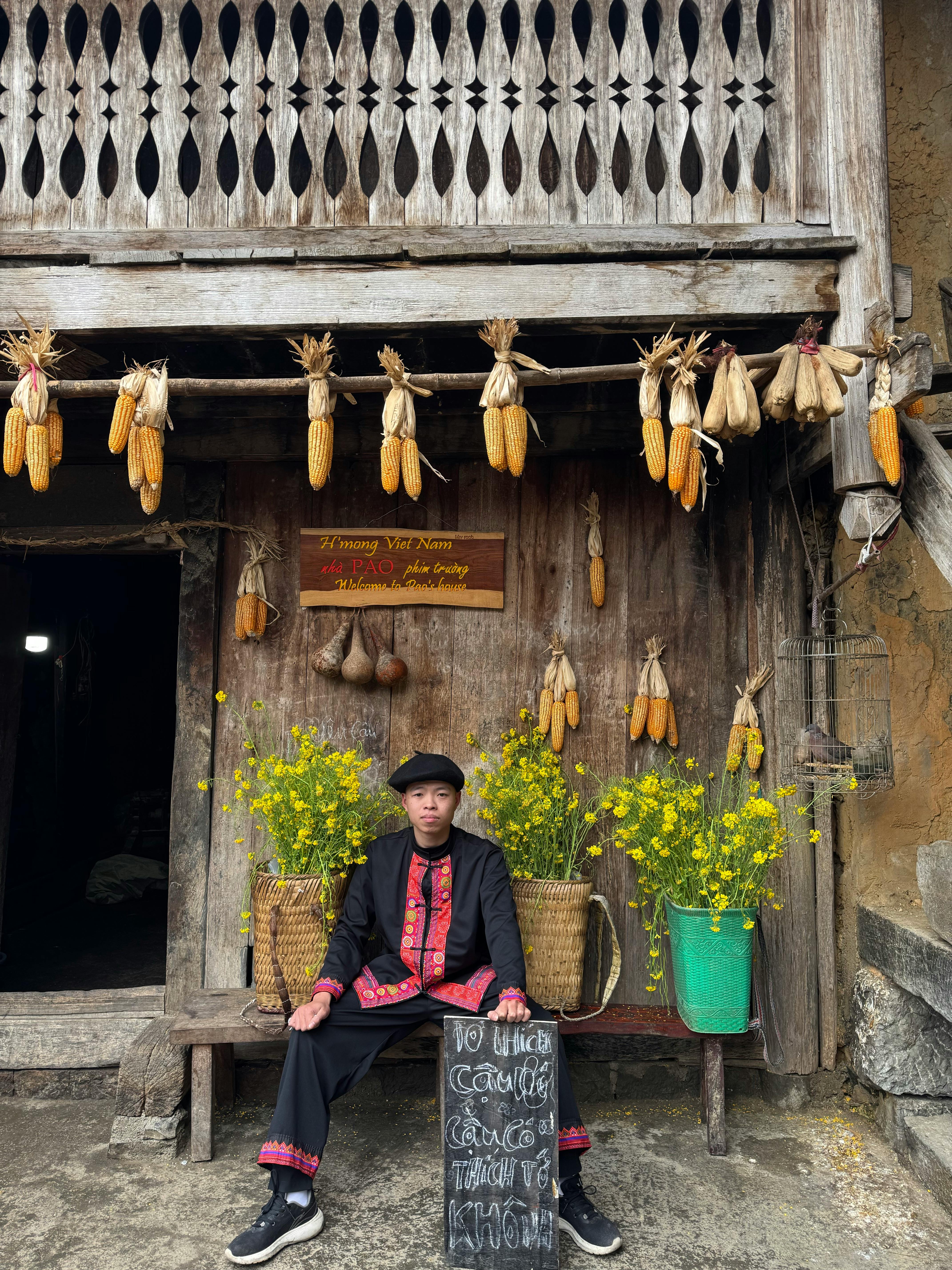 Cultural setting with corn and traditional Vietnamese attire.
