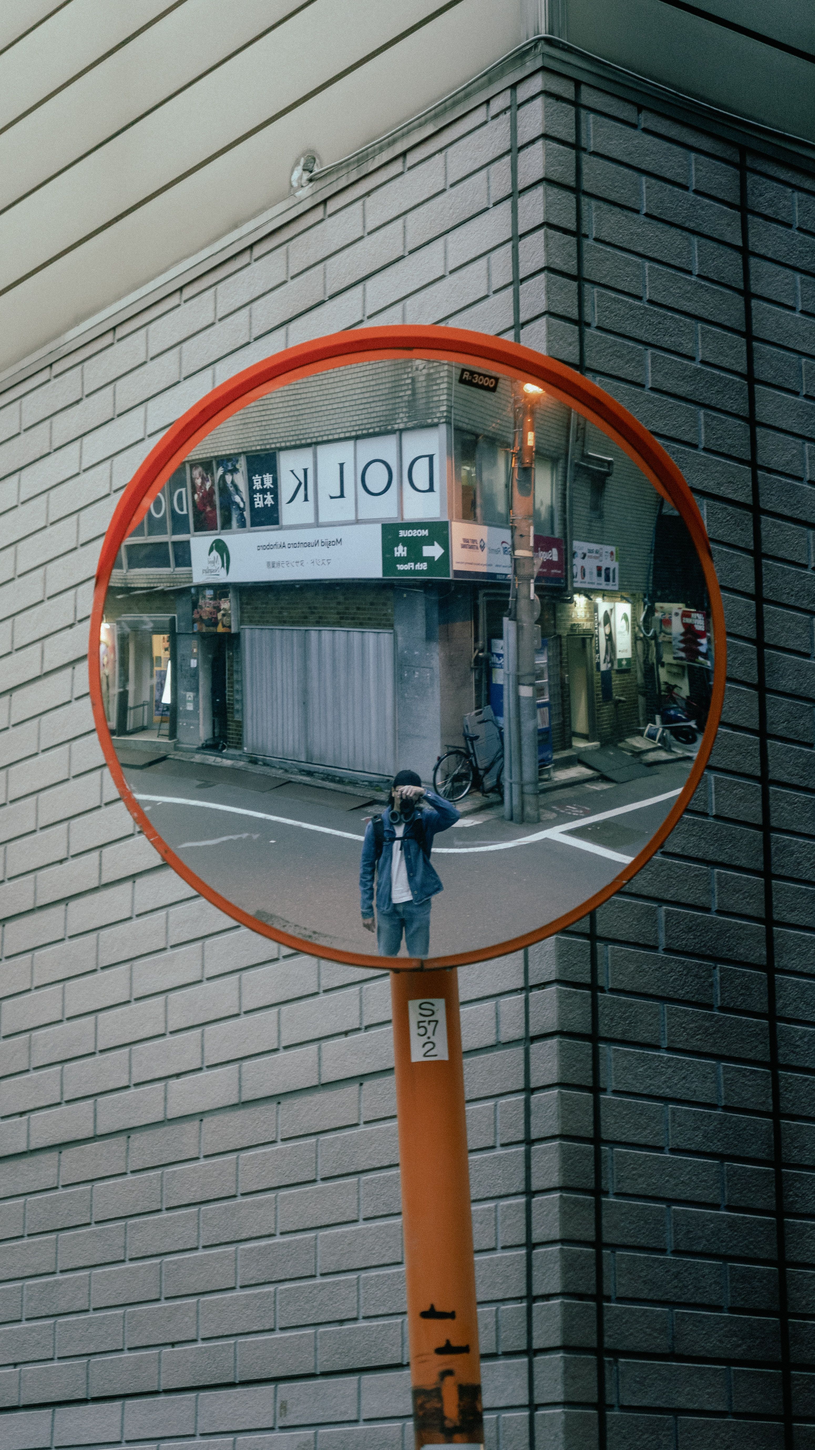 Urban Reflection in Round Street Mirror · Free Stock Photo