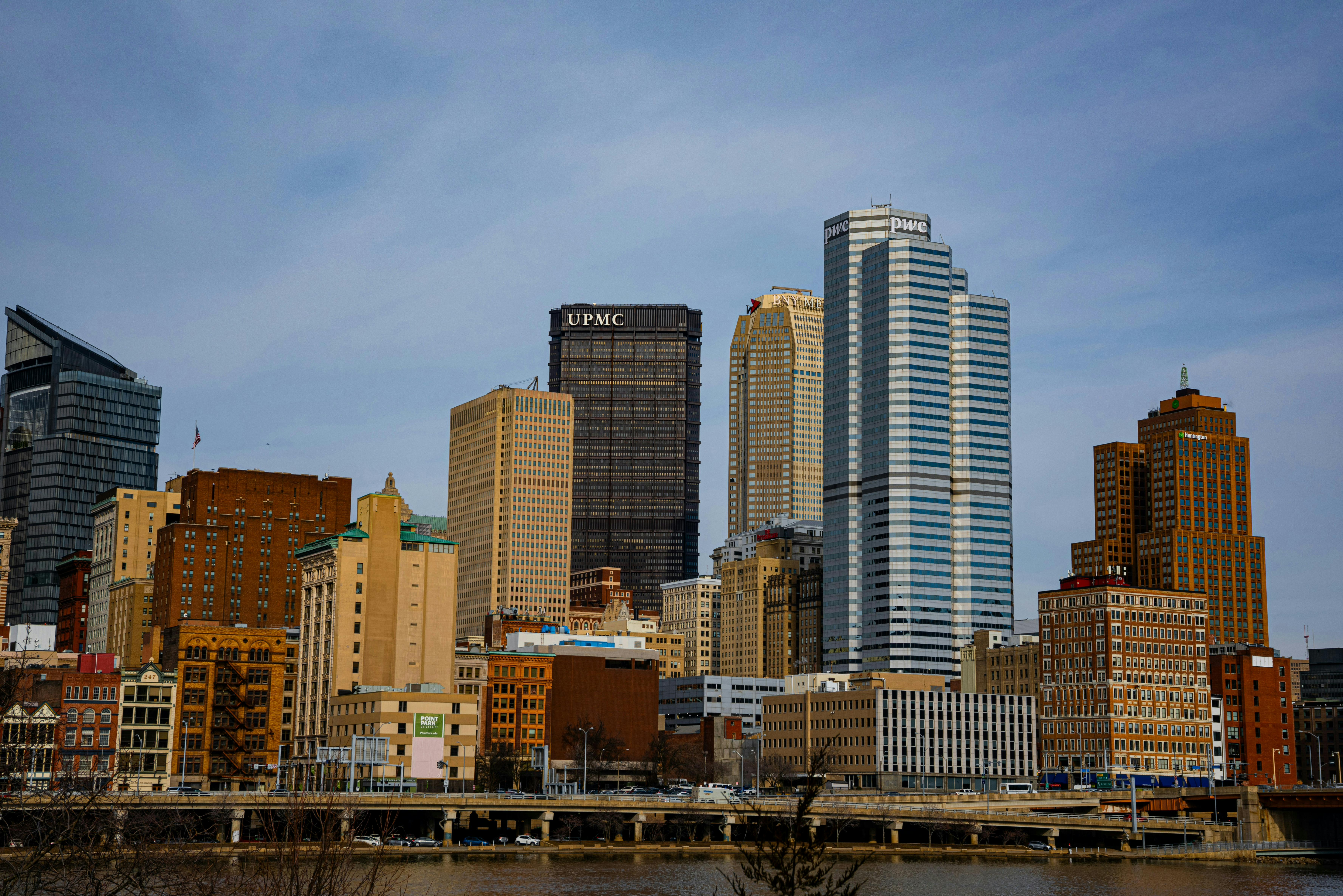 Stunning view of Pittsburgh's skyline featuring the iconic UPMC building under a clear sky.