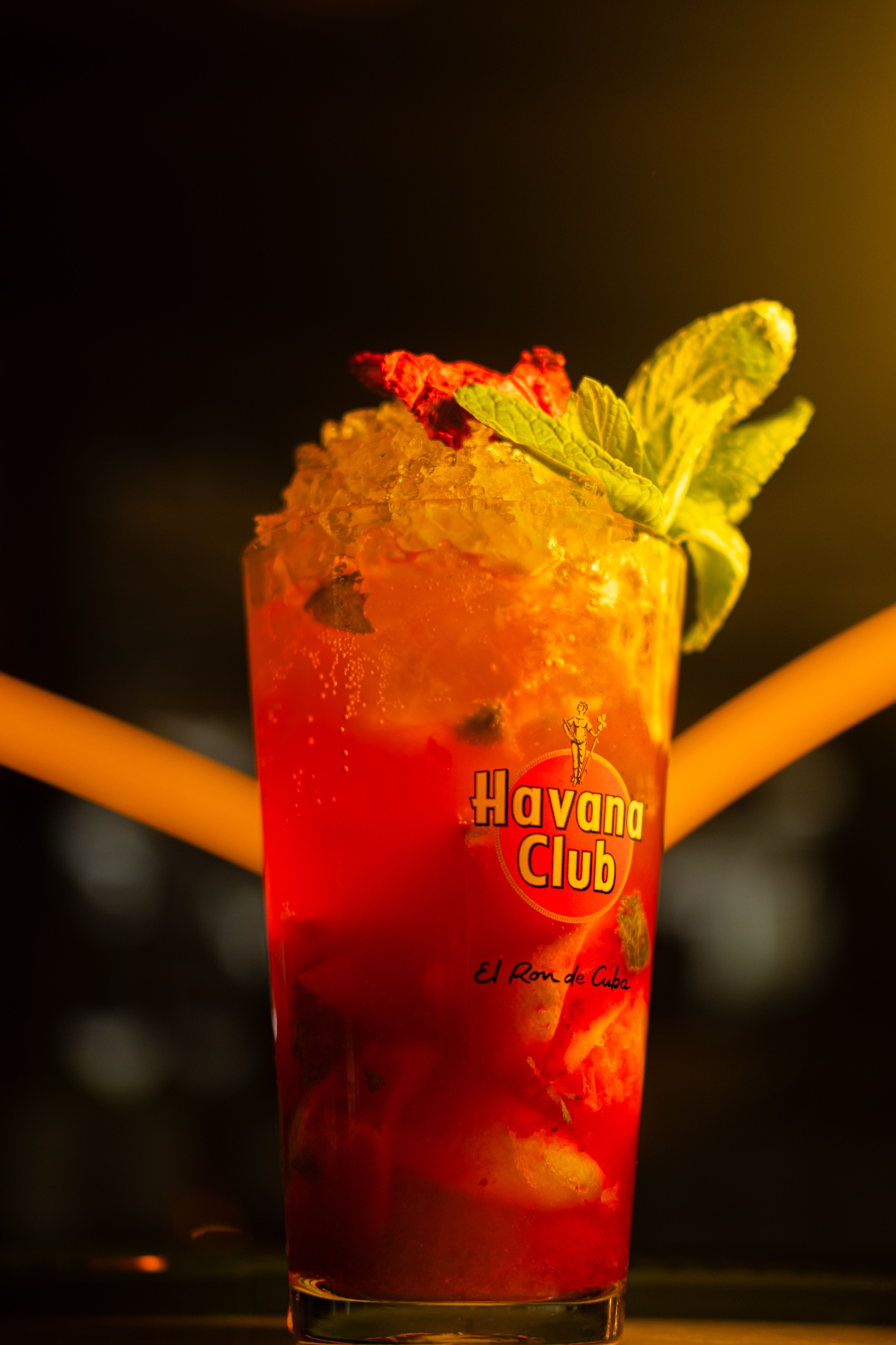 Vibrant Havana Club cocktail with crushed ice and fresh mint leaves.
