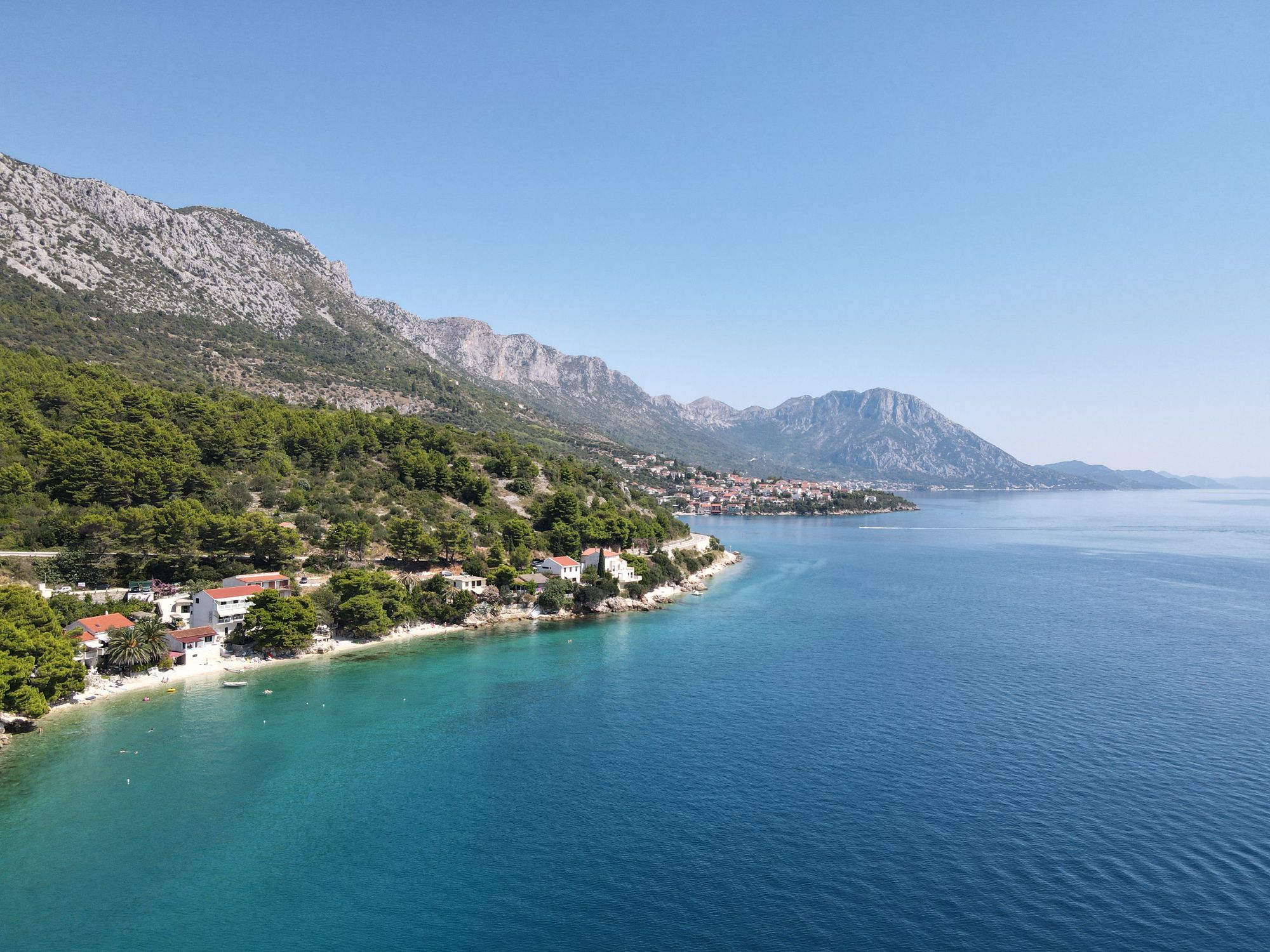 Breathtaking aerial view of the turquoise coastline and mountains in Podaca, Croatia