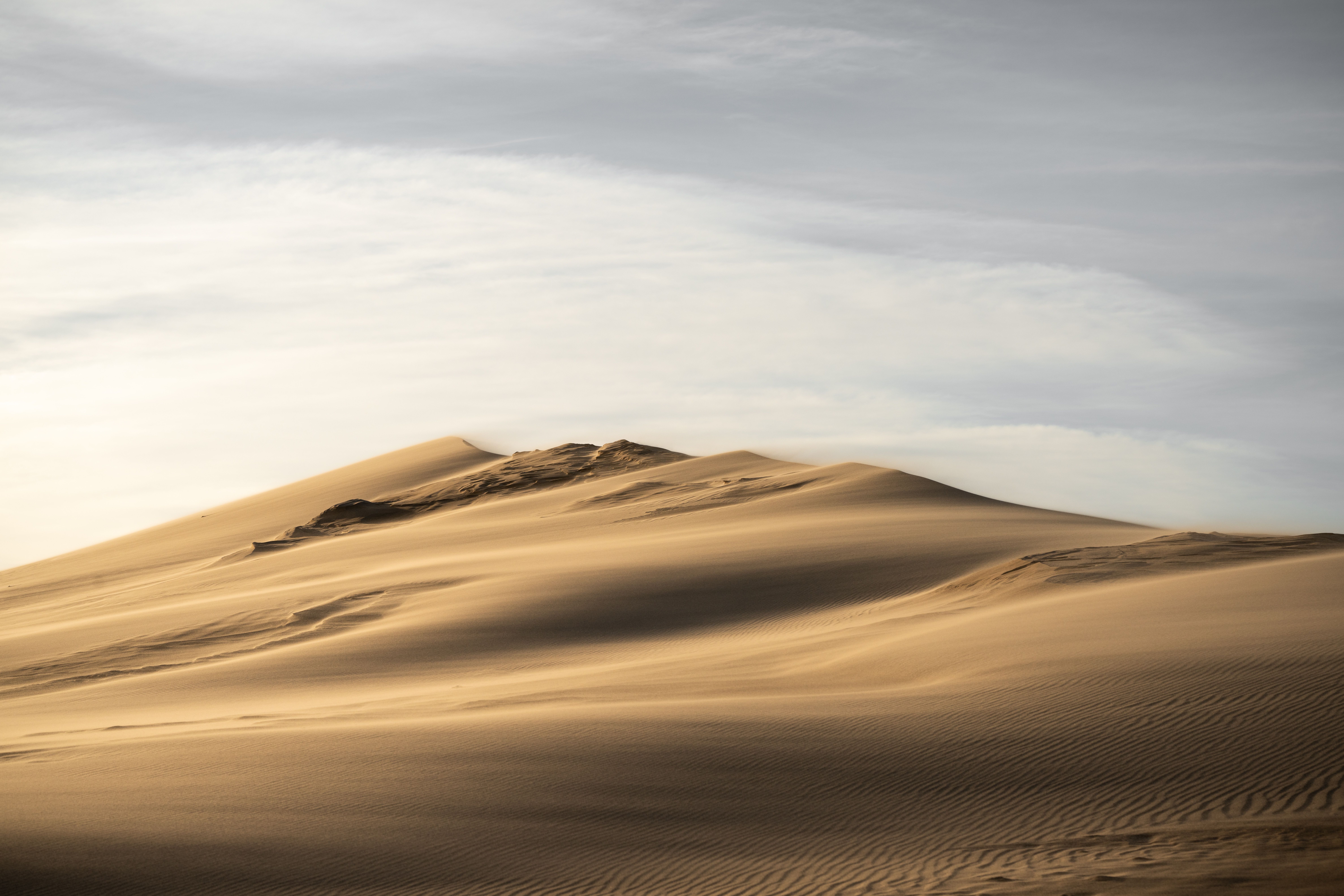 Serene Sand Dunes under a Bright Sky · Free Stock Photo