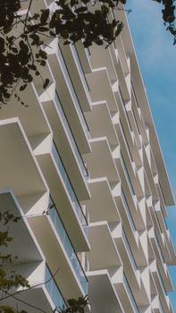 Contemporary apartment building facade in Malé, showcasing modern architectural design and geometric patterns.