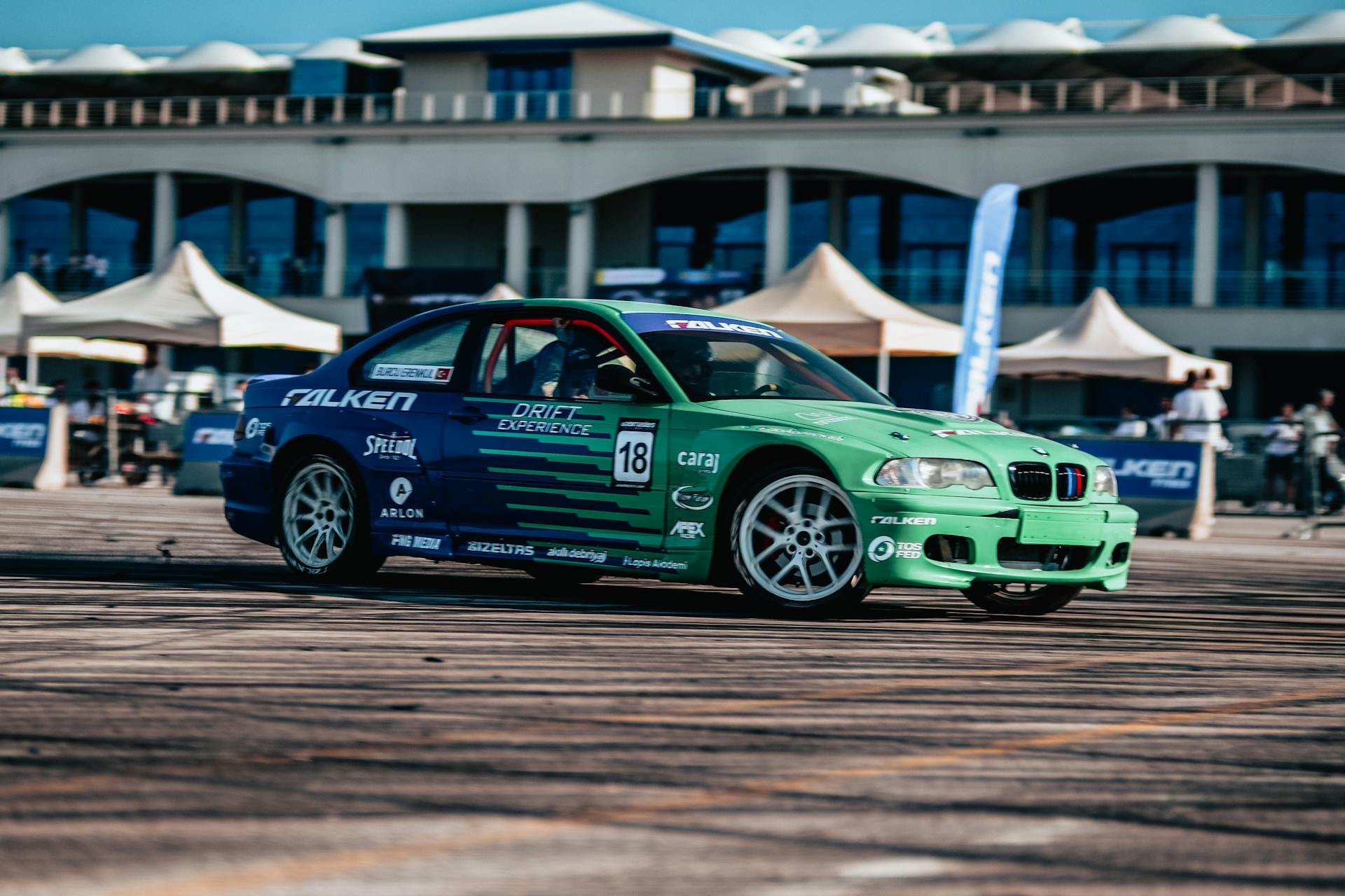 High-speed drift car racing event captured outdoors in İstanbul, Türkiye.