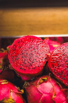 Close-up of vibrant red dragon fruit, perfect for healthy food concepts.