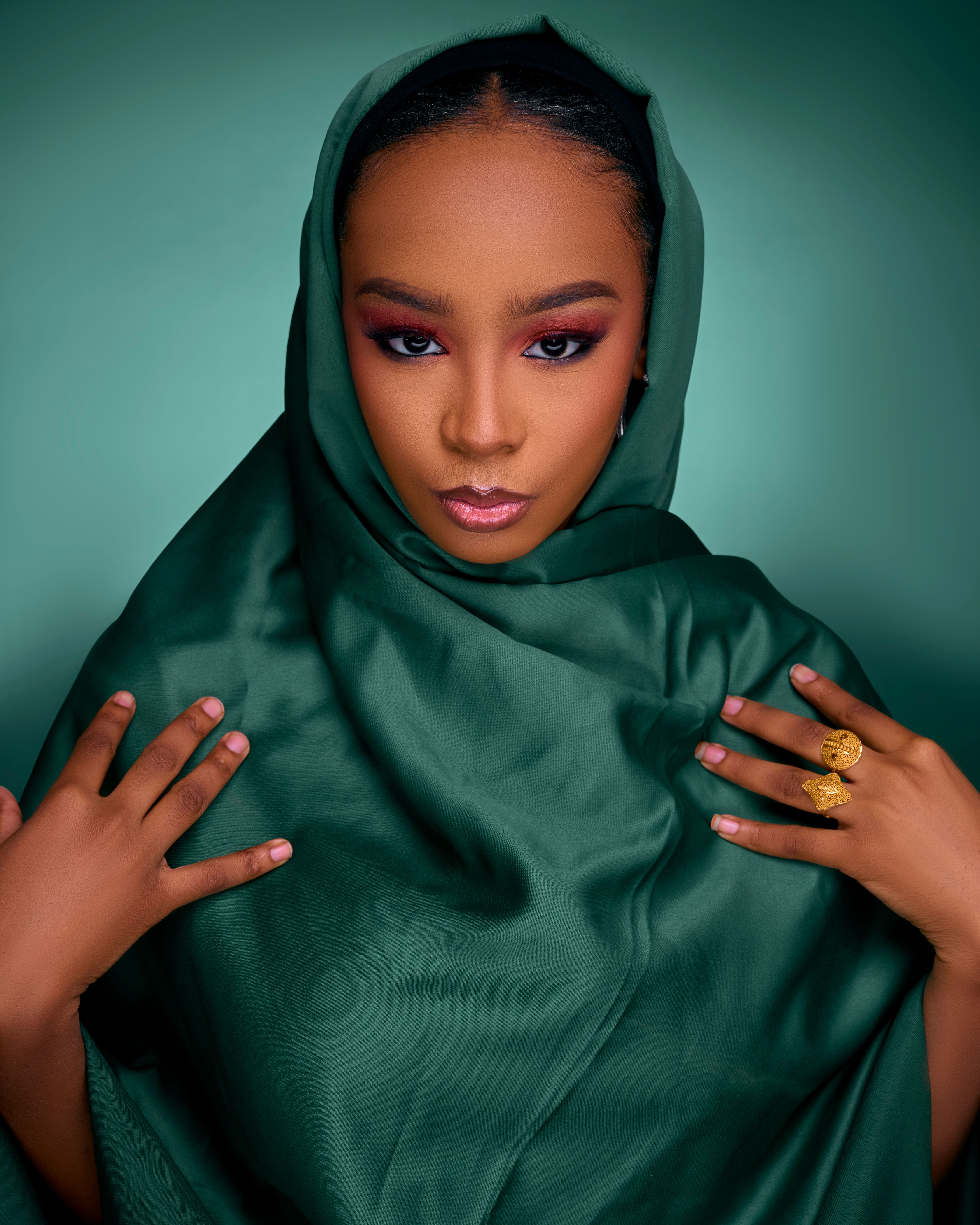 Elegant Portrait of Woman in Green Hijab · Free Stock Photo