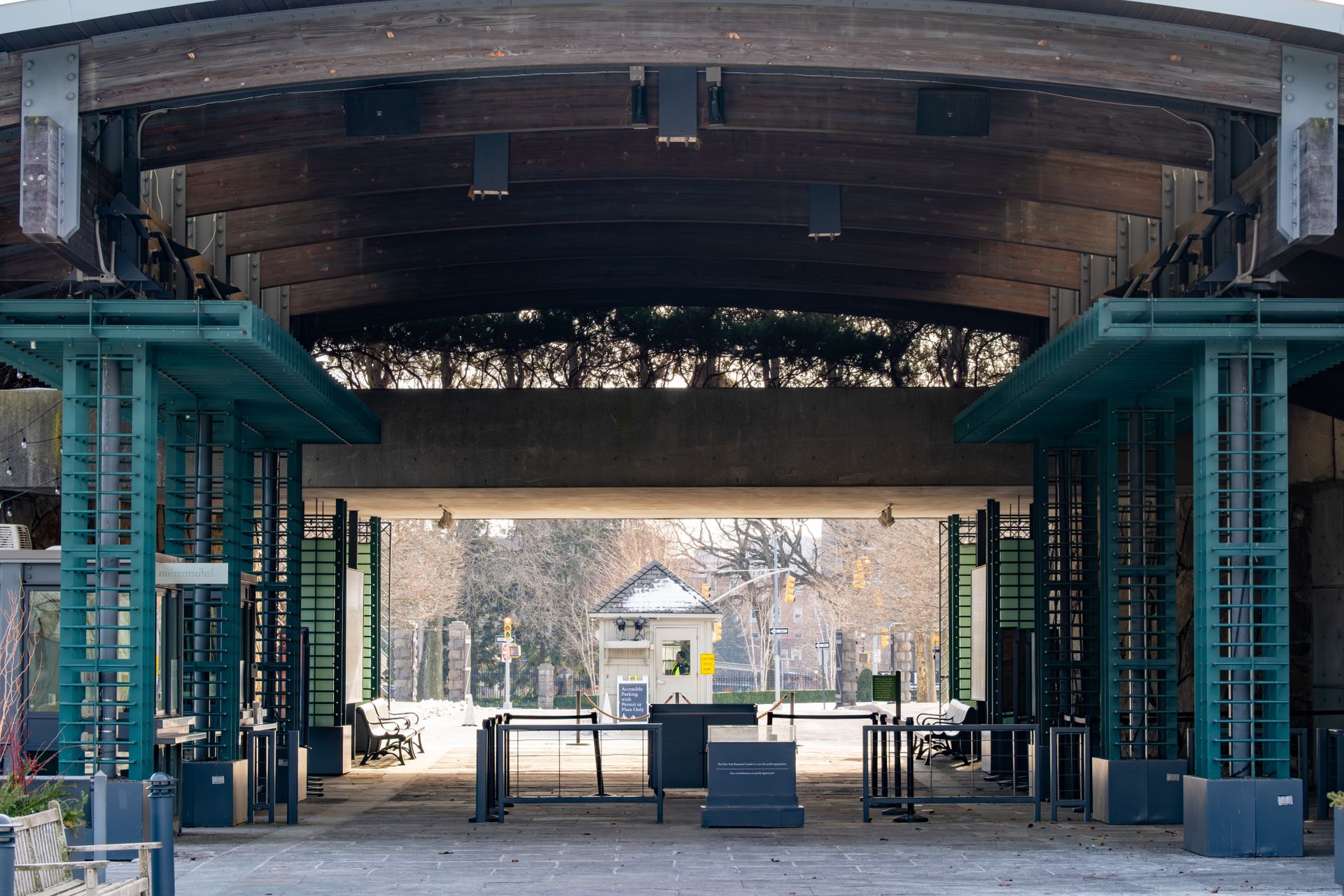 Philadelphia Zoo entrance pavilion with turquoise architectural framing and brick archway, bright daylight