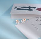 Elegant Diamond Earrings on Gift Card Background