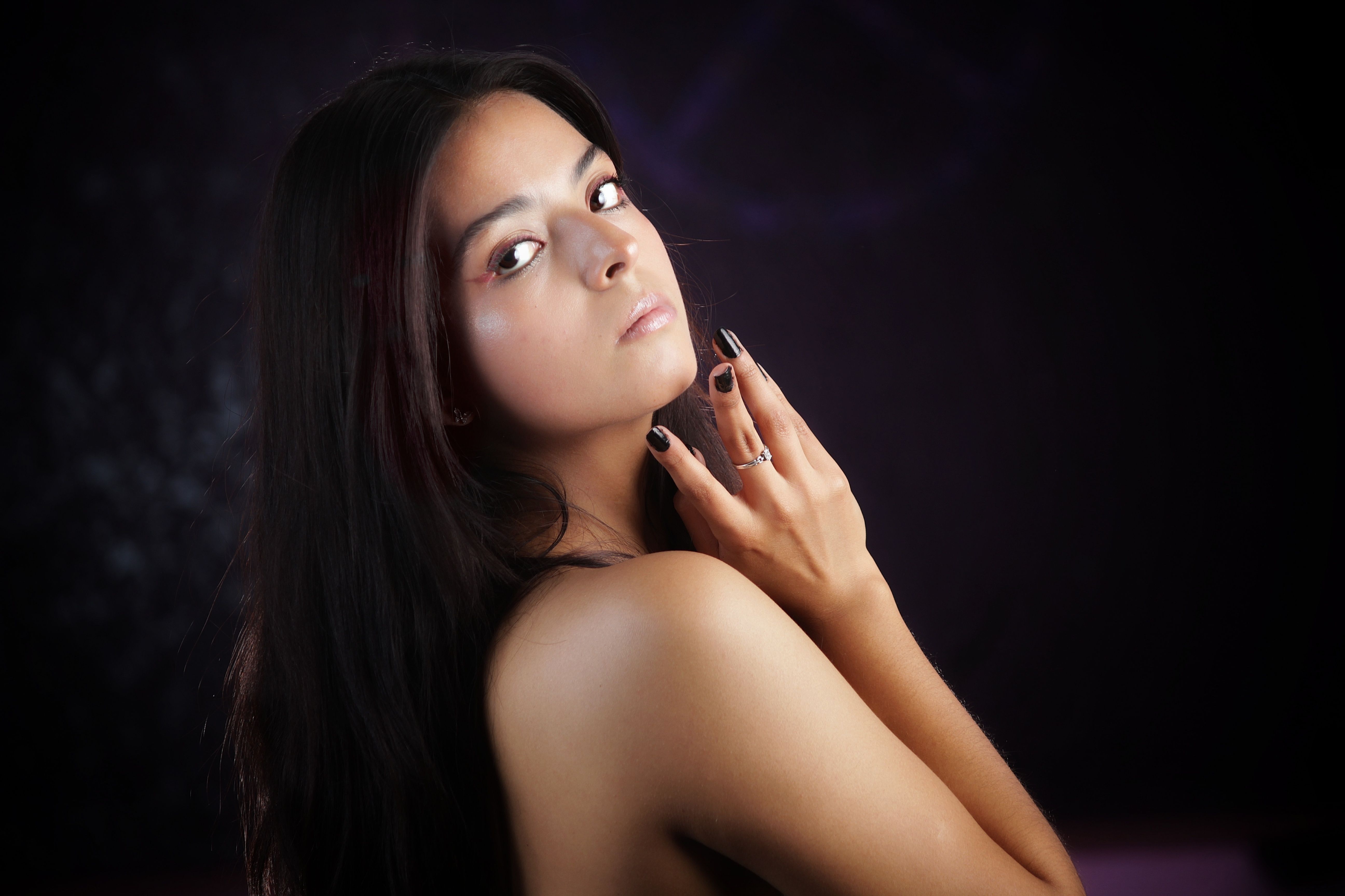 Elegant Portrait of a Woman with Dramatic Lighting · Free Stock Photo