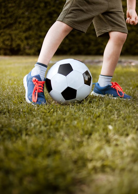 Free Boy Playing With Soccer Ball Stock Photo