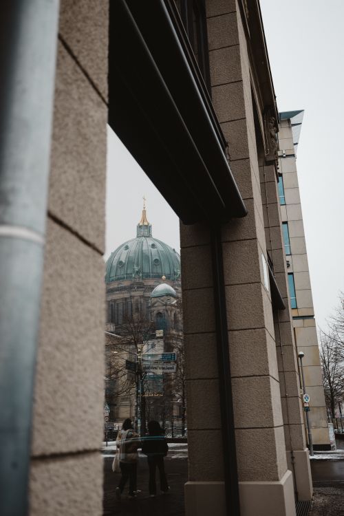 Free Captivating reflection of Berlin Cathedral on a modern building glass facade, blending historic and contemporary Berlin. Stock Photo