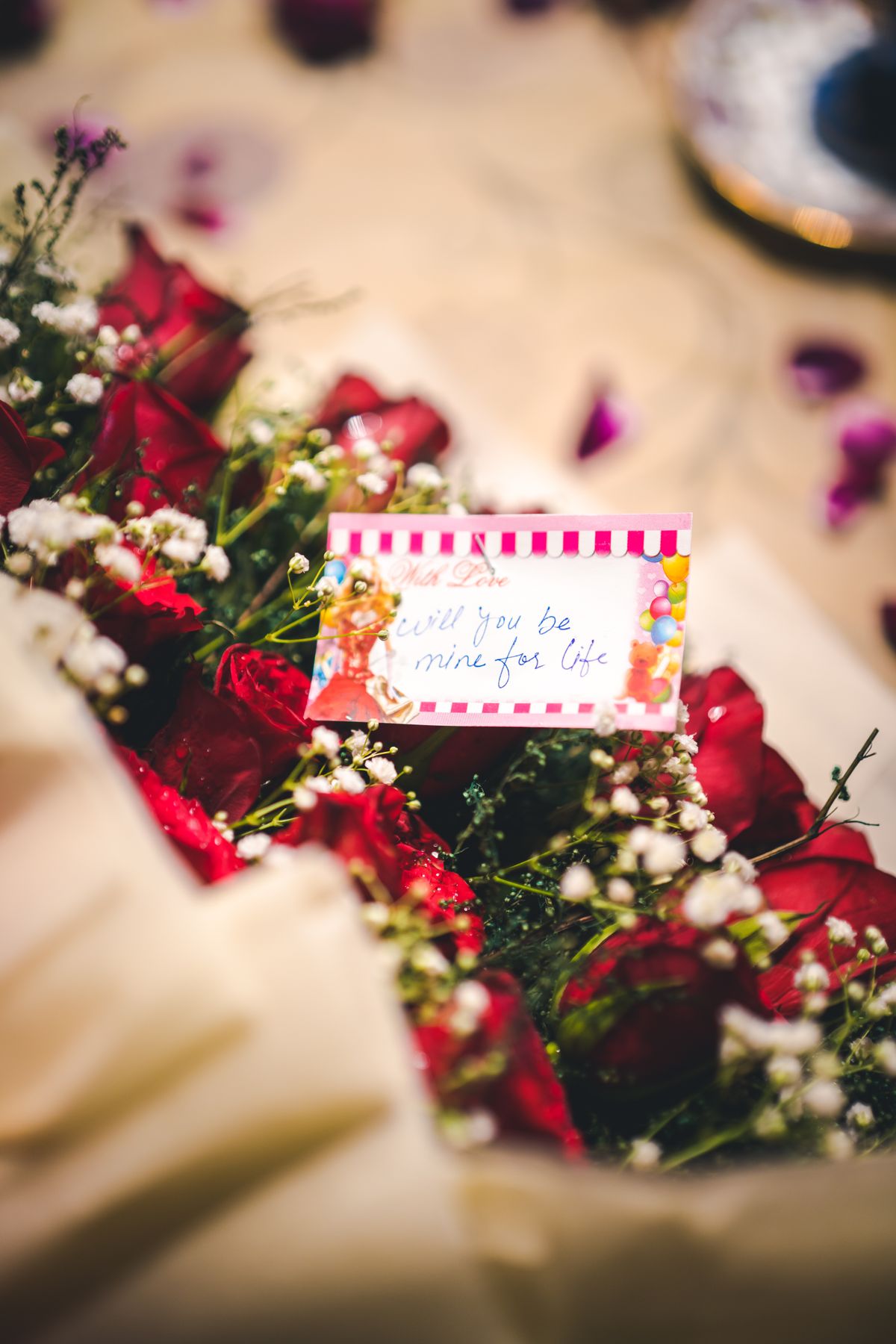 Surprise proposal decoration with flowers balloons and lights