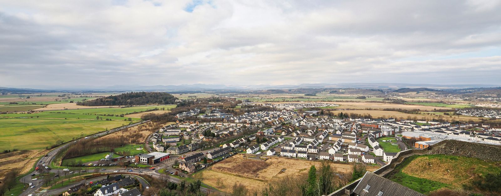 Aerial photograph capturing the expansive landscape of Stirling, Scotland.