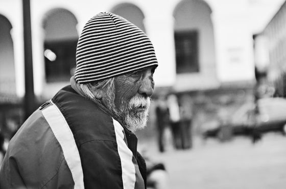 Portrait of an older man in a striped cap, photo by Dave Garcia on Pexels